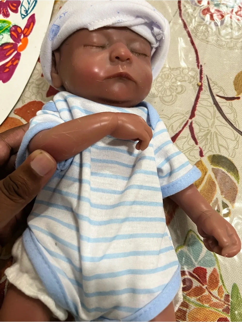 Reborn Brown Baby Doll with Blue & White Striped Outfit